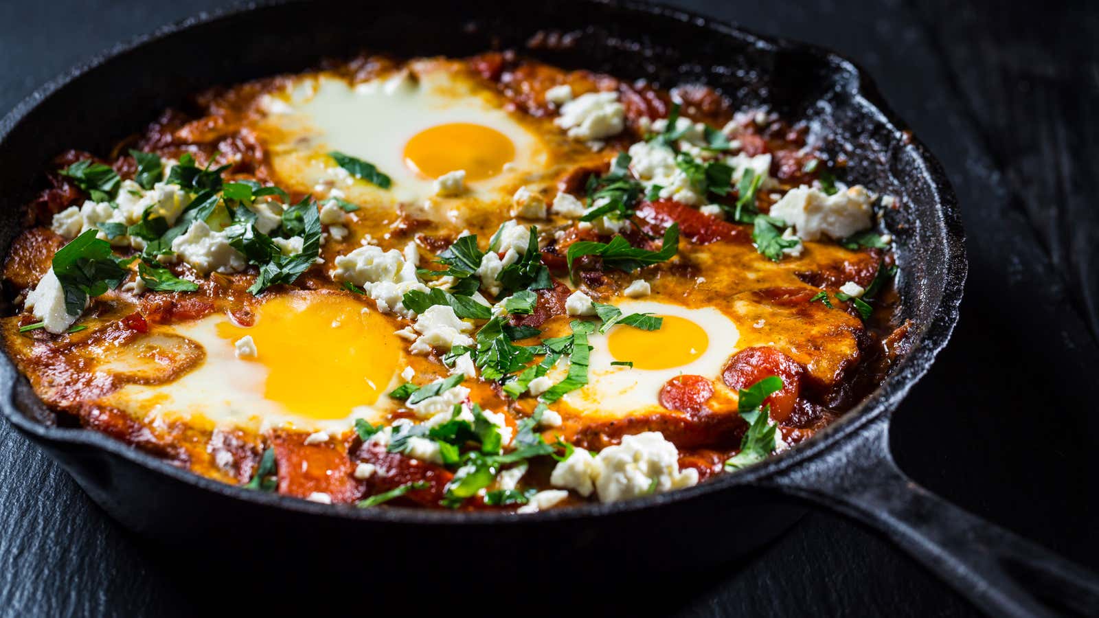 A spin on shakshuka: eggs simmered in a rich, spiced tomato sauce