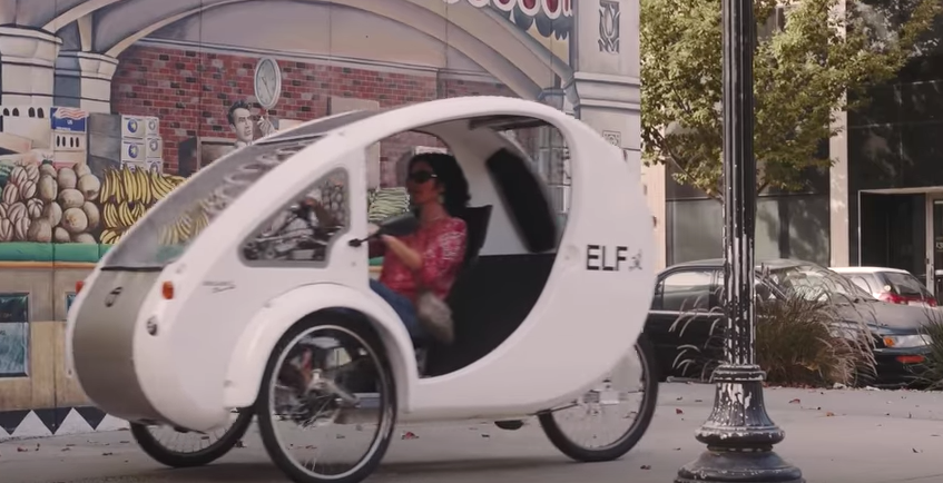 Solar Hybrid Vehicle Gets You Exercising