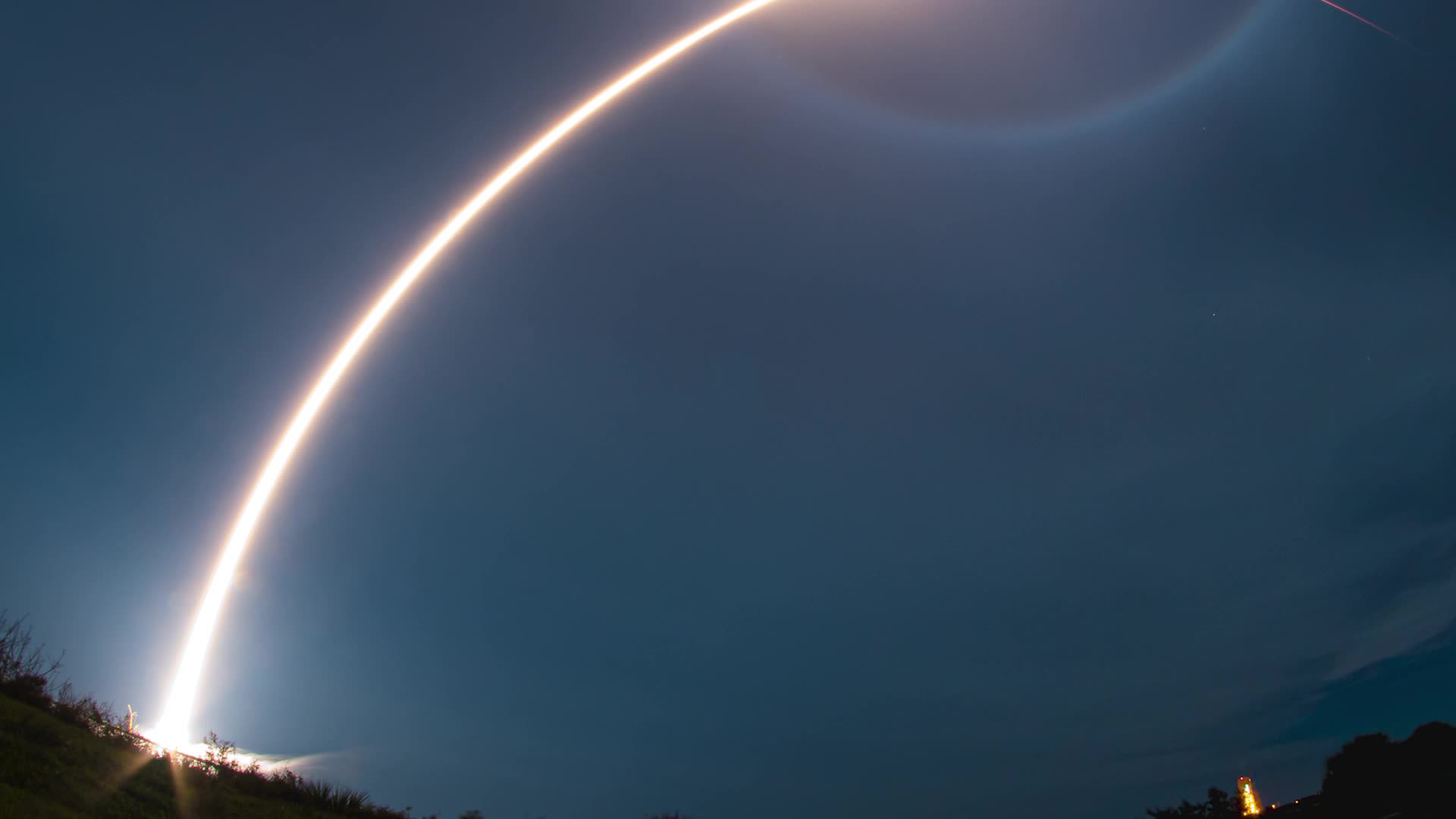SpaceX Rocket Launches As Moon Forms Spectacular Halo