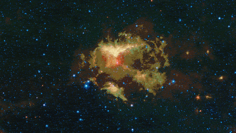 This infrared image from NASA&rsquo;s Spitzer Space telescope shows a cloud of gas and dust carved out by a massive star. A drawing overlaid on the image reveals why researchers nicknamed this region the &ldquo;Jack-o&rsquo;-lantern Nebula.&rdquo;