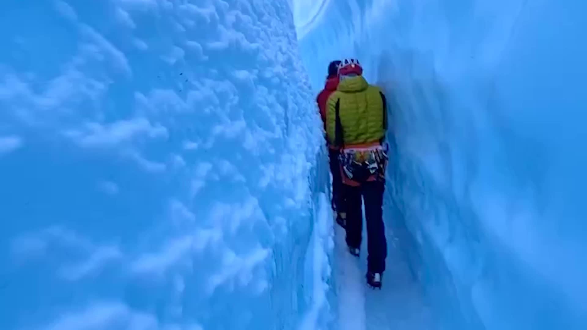 Stunning Walk Through Glacier Crack Is Not for the Claustrophobic