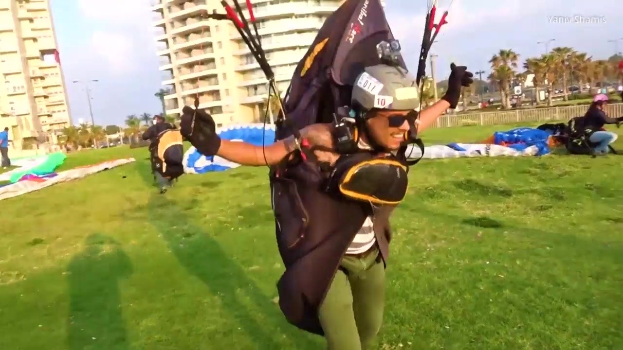 Sunset Paragliding Over The Mediterranean Sea