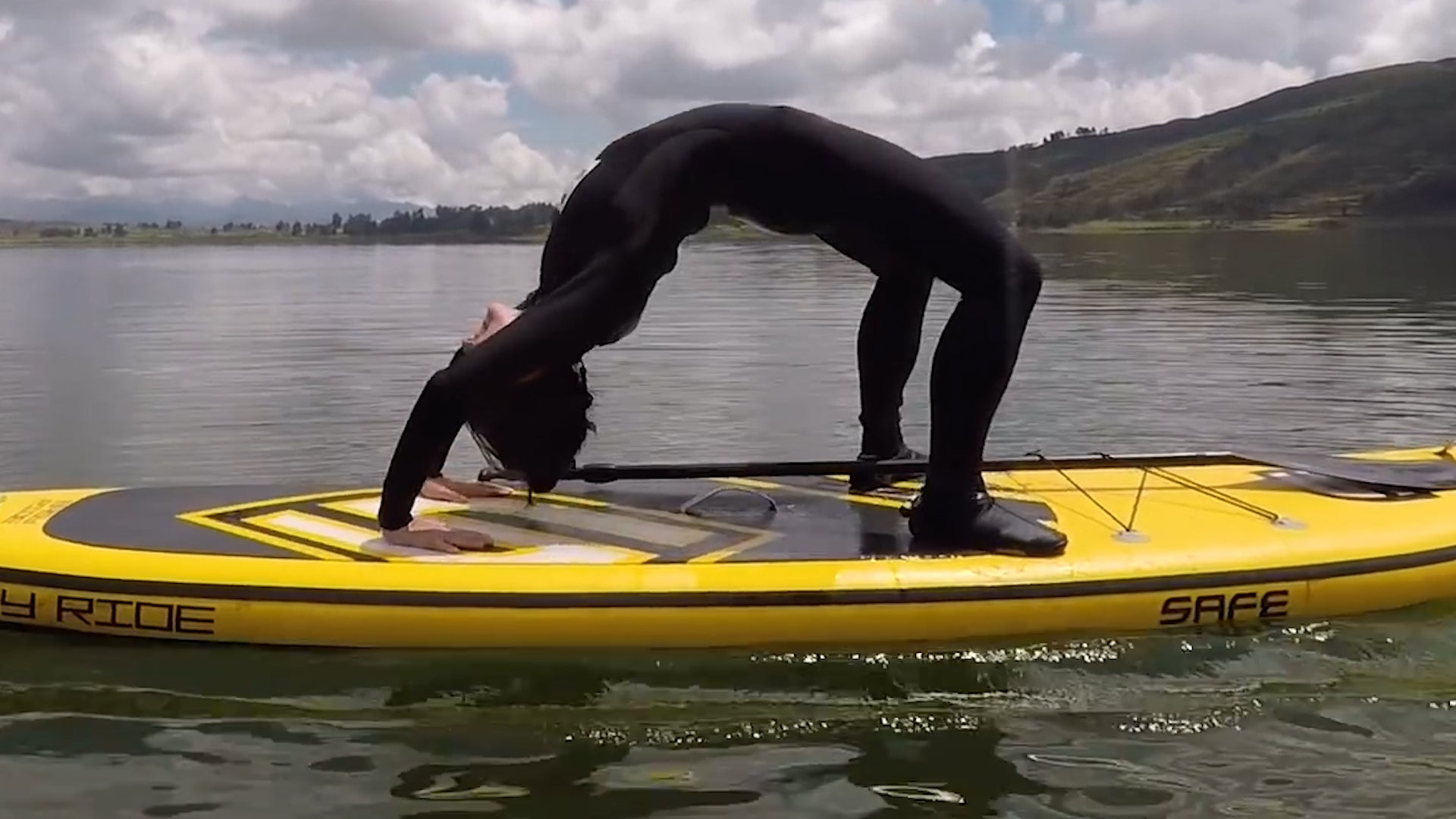This Couple Can Do Yoga On A Paddleboard