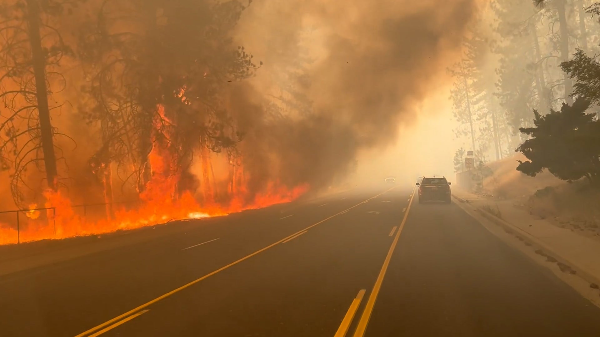 Too close for comfort: Wildfire flames engulf Spokane roads