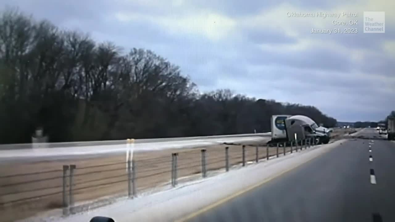 Tractor Trailer Slams Through Highway Barrier On Icy Oklahoma Bridge