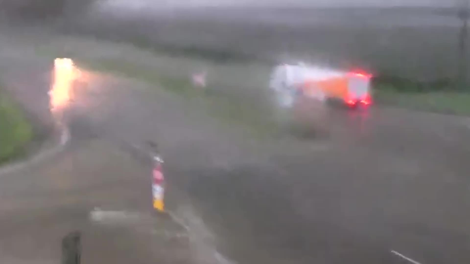Traffic Camera Captures Iowa Tornado Toppling Semi-Truck