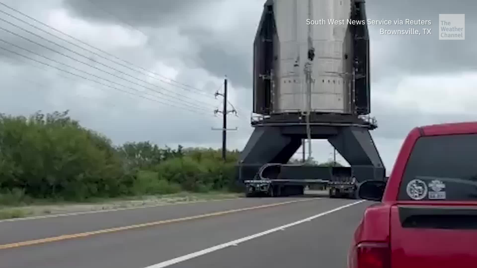 Traffic Stopper: Huge Rocket Slowly Rolls Along Texas Road