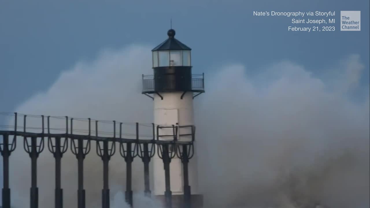 Waves Crash And Cover Lake Michigan Lighthouse