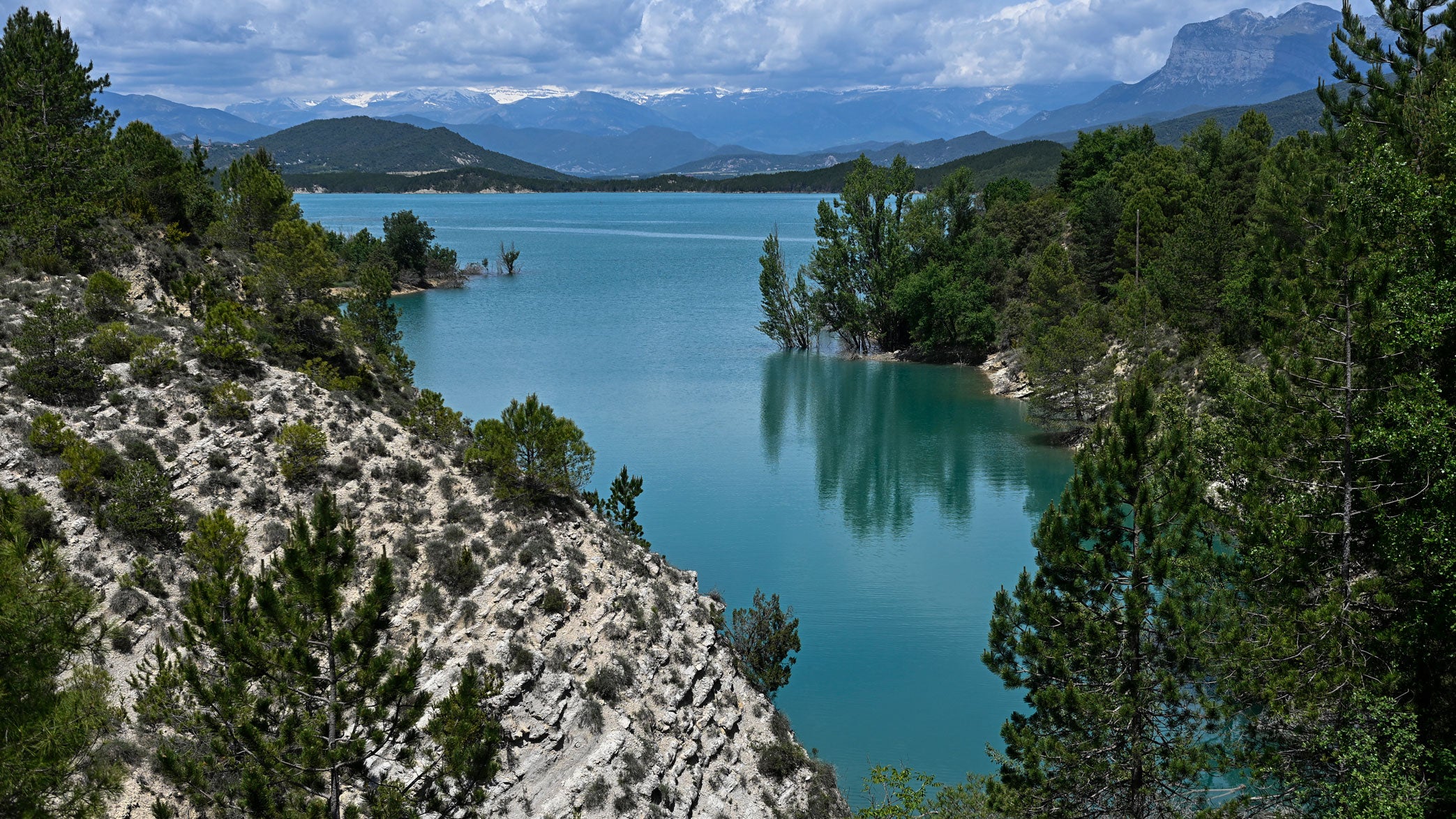 A view of the Mediano reservoir amid high water level, in Mediano, Huesca province, on May 19, 2026. This long-term project shows an inventory of several sites in Spain which are suffering from drought. Photos of the same places are taken every month over a very long period. 
