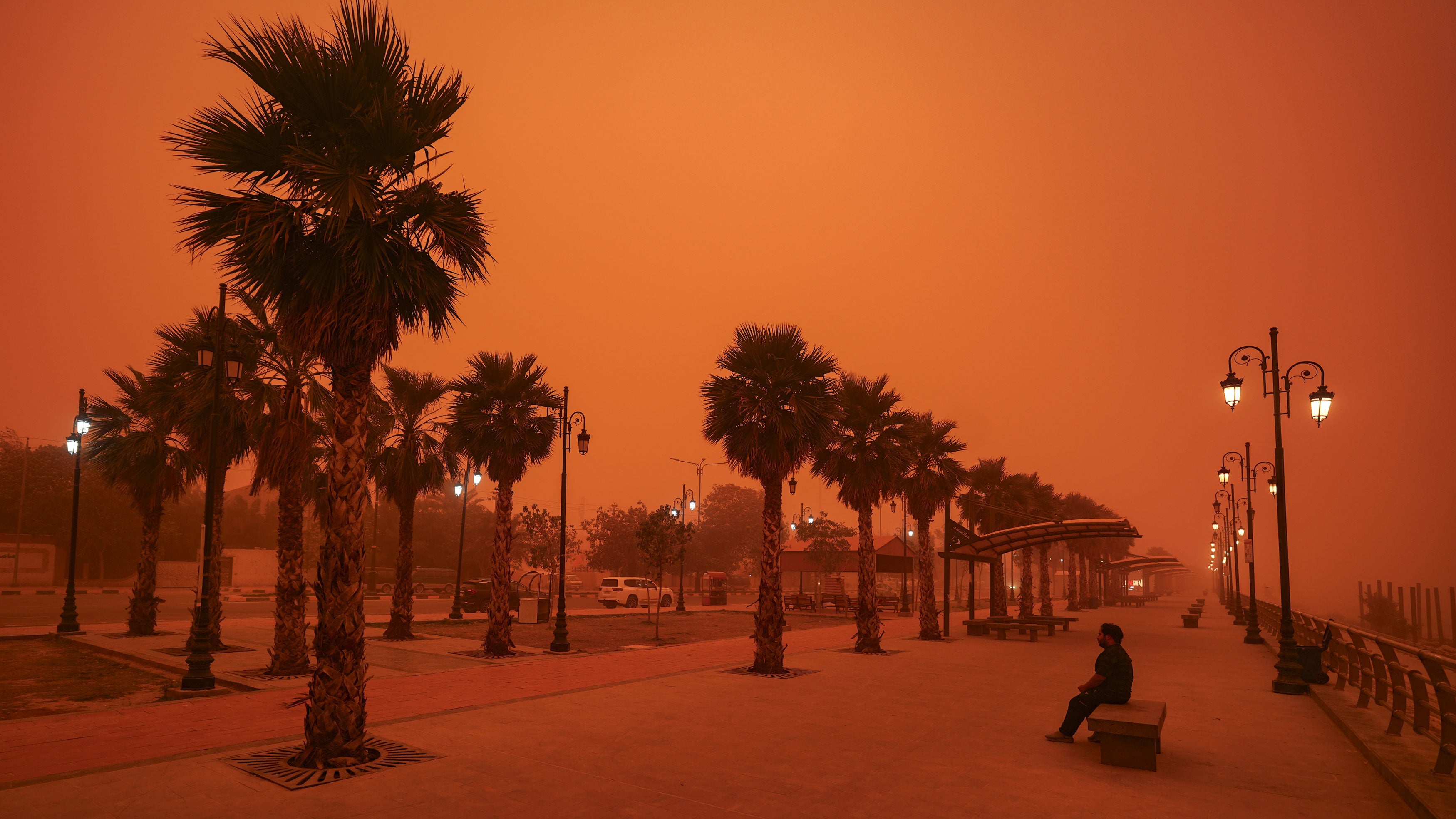 A view of a sandstorm sweeping through the city of Najaf, Iraq, affecting daily life and reducing visibility in traffic on May 18, 2026.