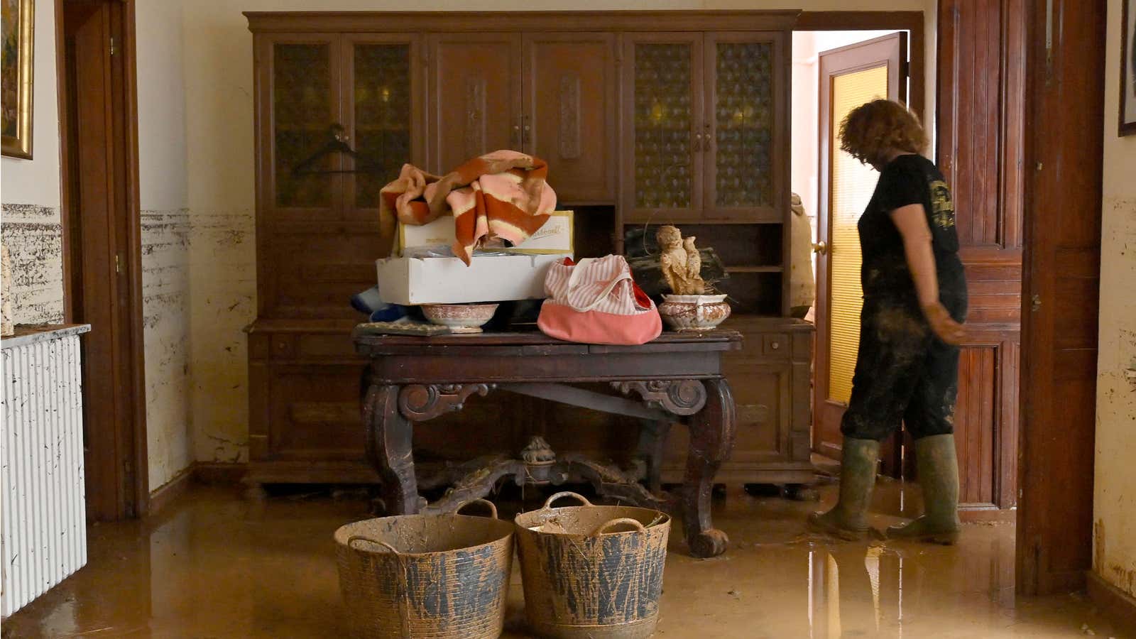 The water level is seen on the walls of a house after floods in Madrigueras, near Albacete, southeastern Spain, on Oct. 3, 2026. A 102-year-old woman died in her home following floods in Madrigueras, where heavy rains fell for several hours on Oct. 2.