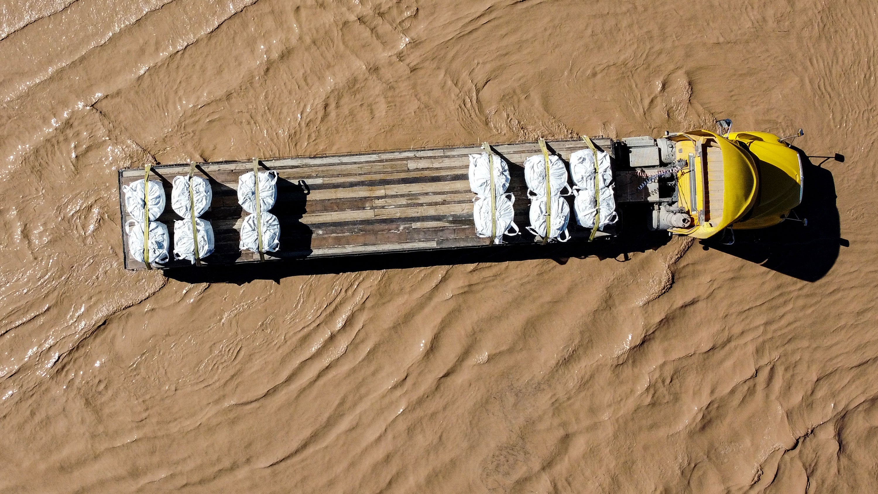 This aerial view shows a truck stranded on a flooded road after the Rio Grande overflowed following heavy rainfall along the U.S.-Mexico border in Ciudad Juarez, Chihuahua state, Mexico, on Oct. 1, 2026.