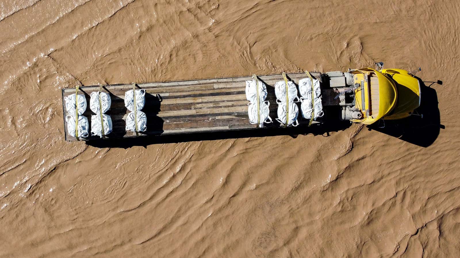 This aerial view shows a truck stranded on a flooded road after the Rio Grande overflowed following heavy rainfall along the U.S.-Mexico border in Ciudad Juarez, Chihuahua state, Mexico, on Oct. 1, 2026.