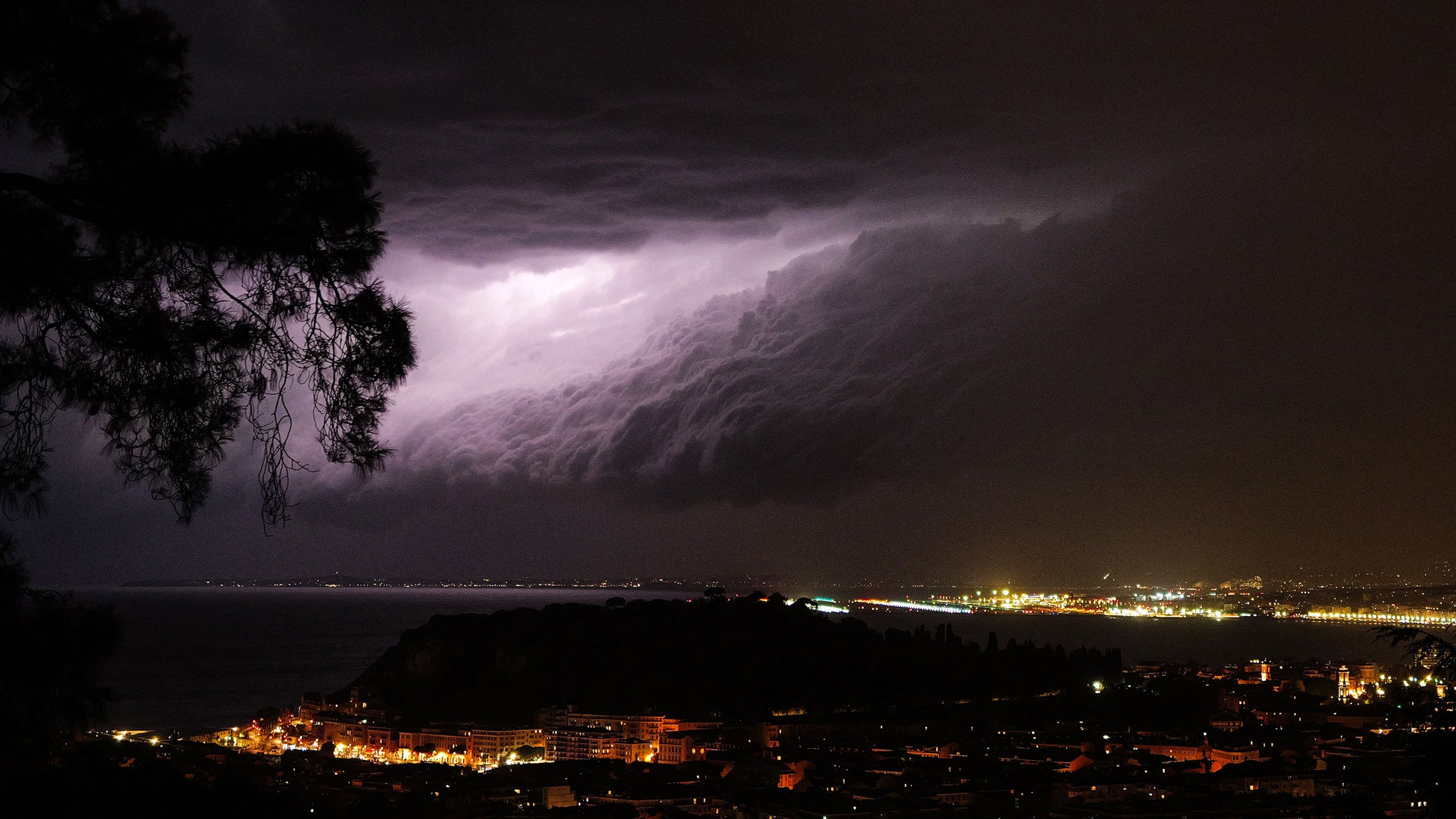 Lightning strikes in the arcus cloud over the Bay of Angels in the French Riviera city of Nice, southeastern France, on Monday, Aug. 24, 2026.