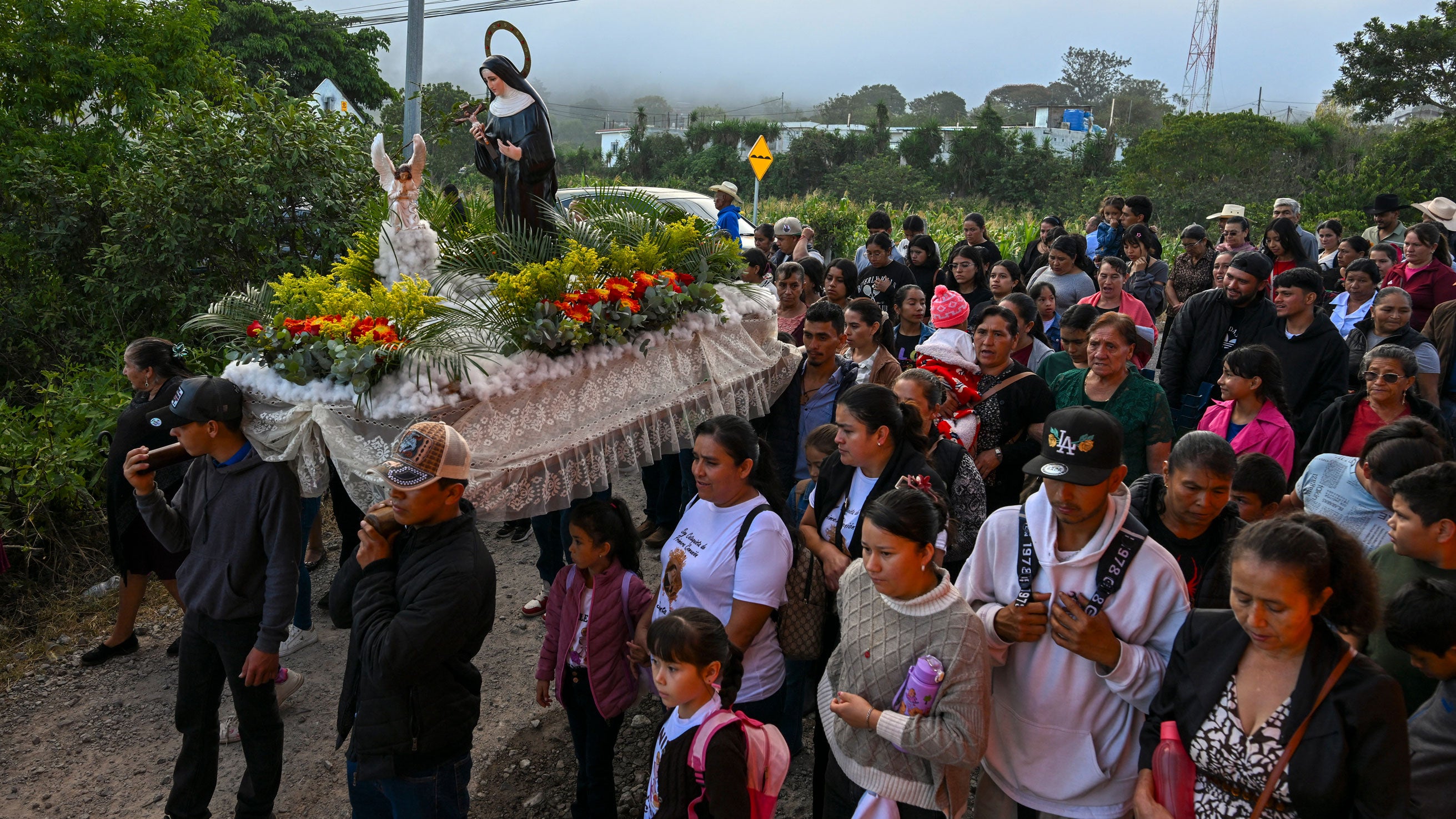 Catholics carry an image of Saint Rita during a procession before a Mass to pray for rain amid a prolonged drought in Palencia, Guatemala, on Sunday, Aug. 30, 2026.