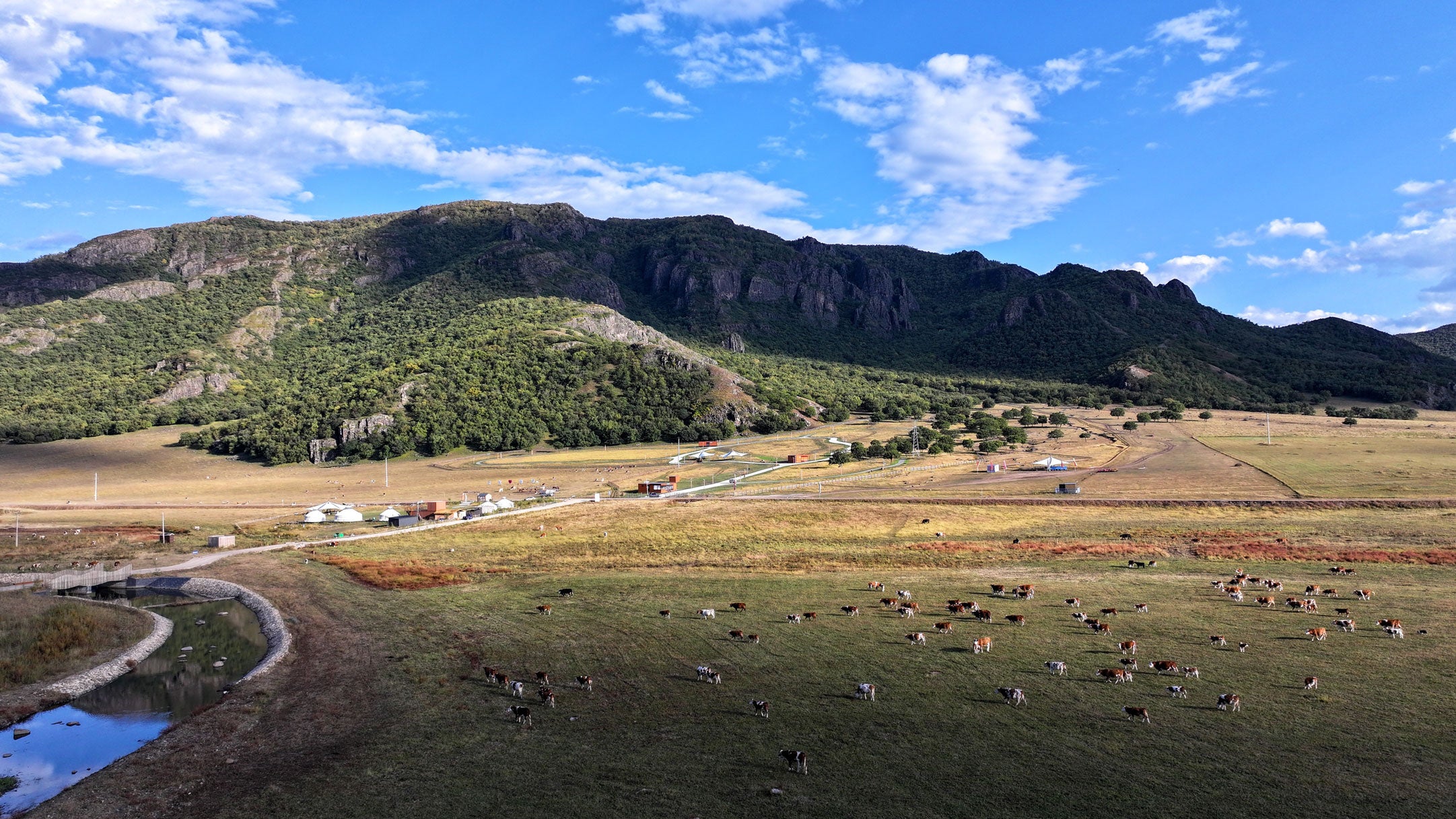 A drone photo taken on Sept. 15, 2026, shows a view of the Heiyang mountain scenic area in Horqin Right Wing Front Banner, Hinggan League, Inner Mongolia Autonomous Region, China.