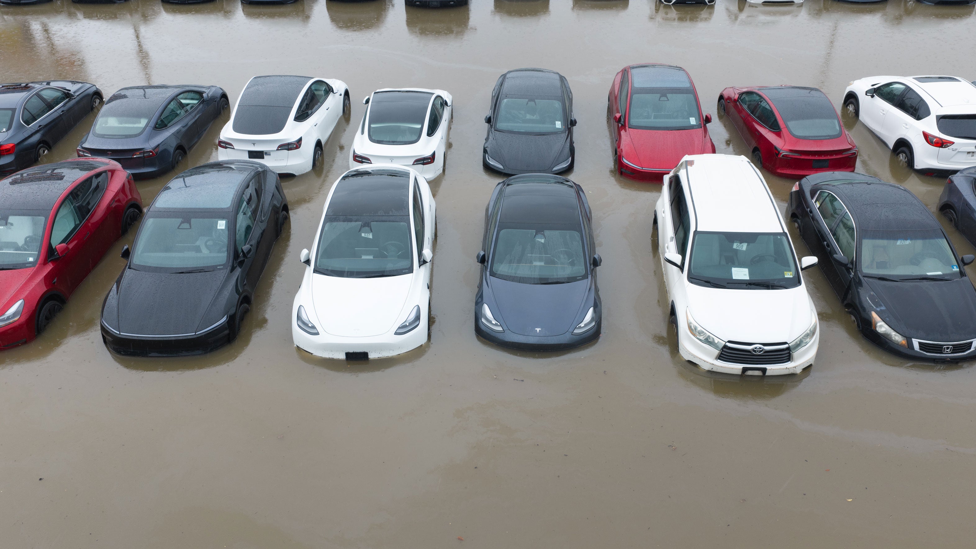 Major flooding hit Paterson, New Jersey, United States, on Sept. 13, 2026, with streets across the city shut down and partially submerged by floodwaters. More than 50 vehicles at a Tesla dealership in Totowa were also affected by rising floodwaters.
