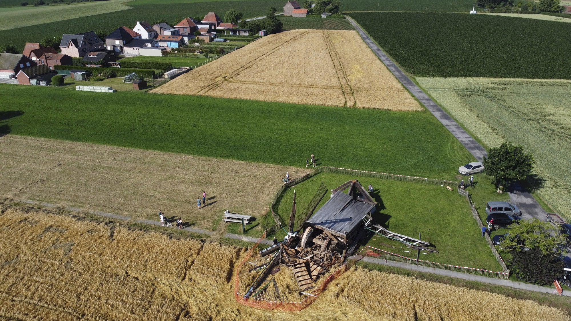 This aerial photo shows the damaged historical Huisekouter mill after being swept away by an overnight thunderstorm in Huise, Kruisem, on June 20, 2026. The Belgian Royal Meteorological Institute (KMI) issued a code orange warning for heat and severe thunderstorms.