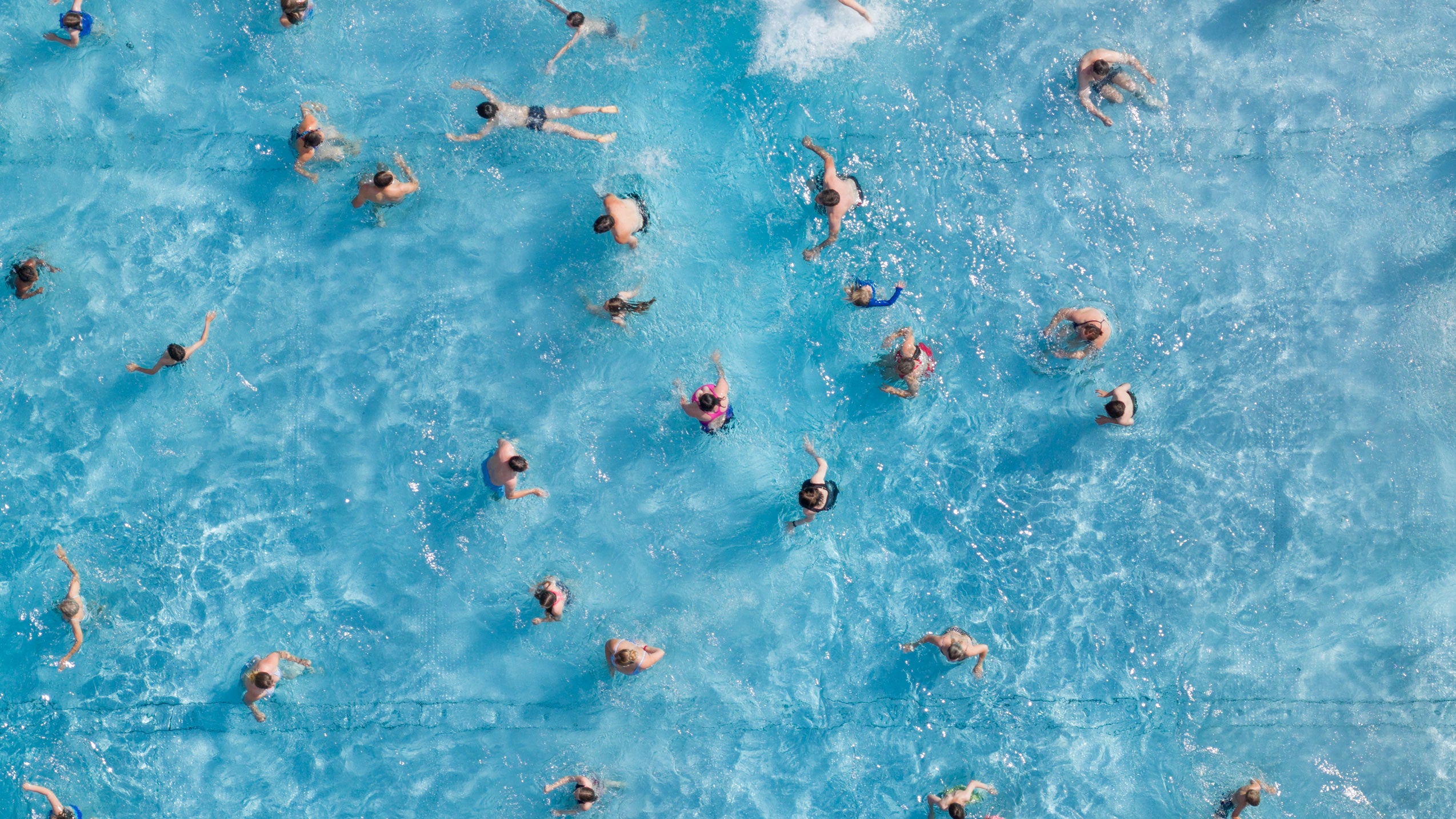 Many swimmers are in the pool at an outdoor swimming facility, Saxony, Radebeul, on June 19, 2026.