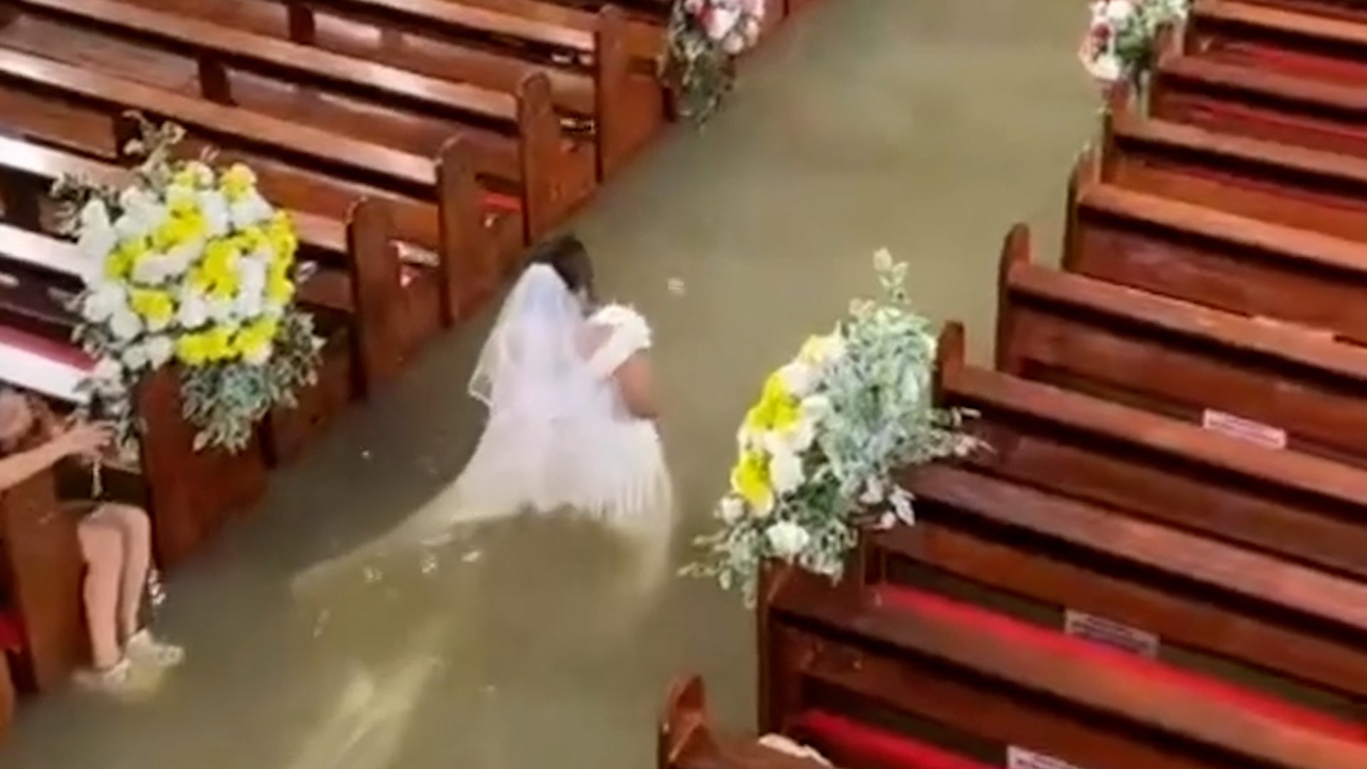 Neither rain nor monsoon or flooded church could stop this wedding