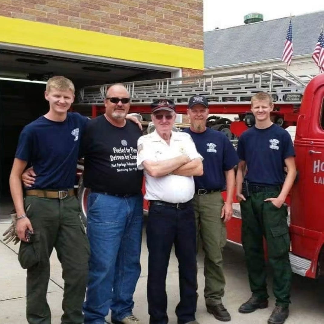 The Stevens family, three generations of firefighters. From left to right: son Riley, uncle Jim, grandpa Skip Marvin, father Alan and son Seth.