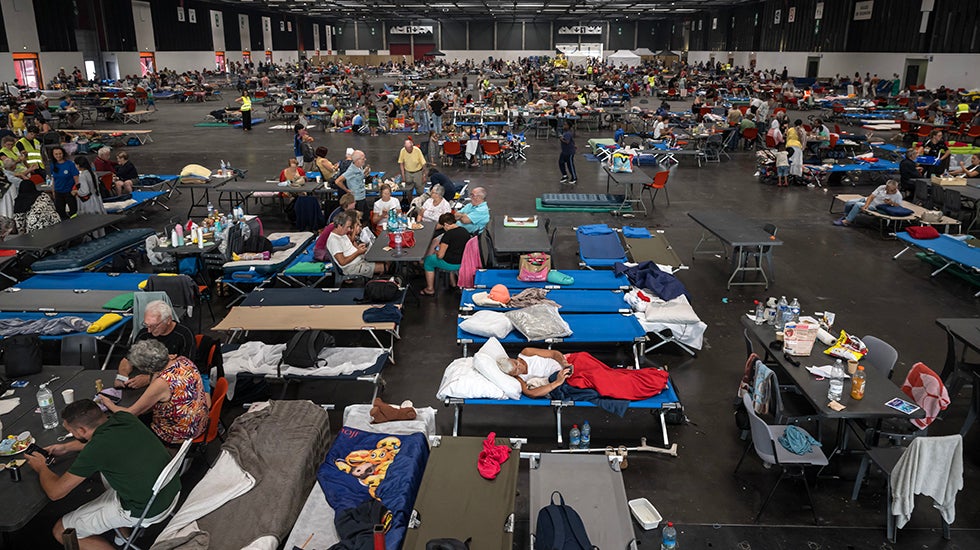 Row after row of cots in an emergency wildfire shelter