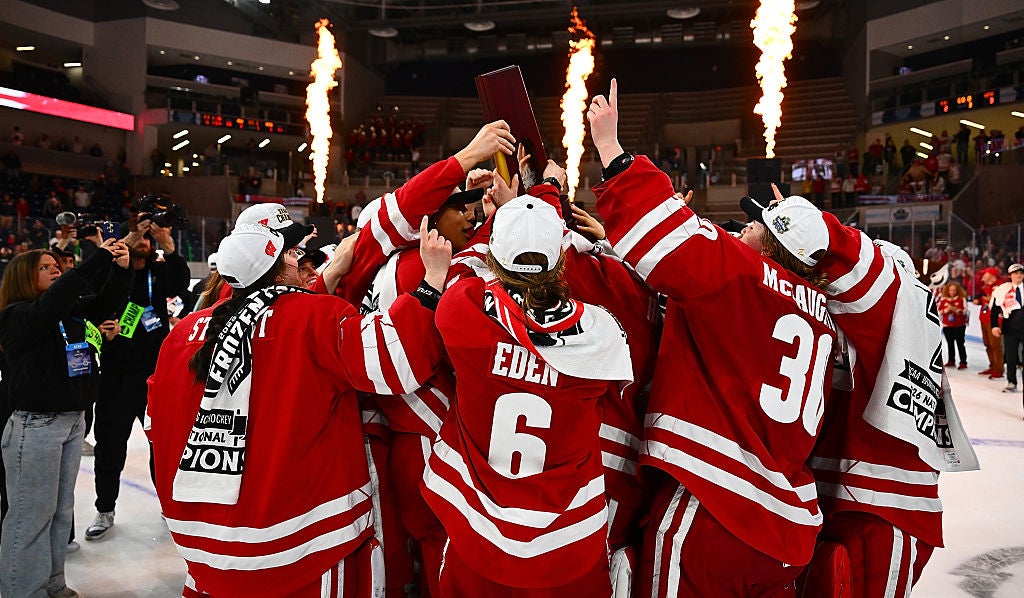 Wisconsin celebrates its 3-2 win over Ohio State in the 2026 NCAA women's championship game. The rivals meet again at Lambeau Field on Feb. 20, 2027.